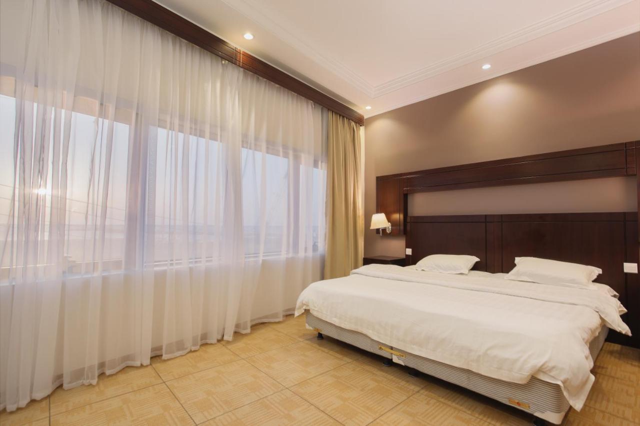 Sand Beach Suites Rayyis Extérieur photo